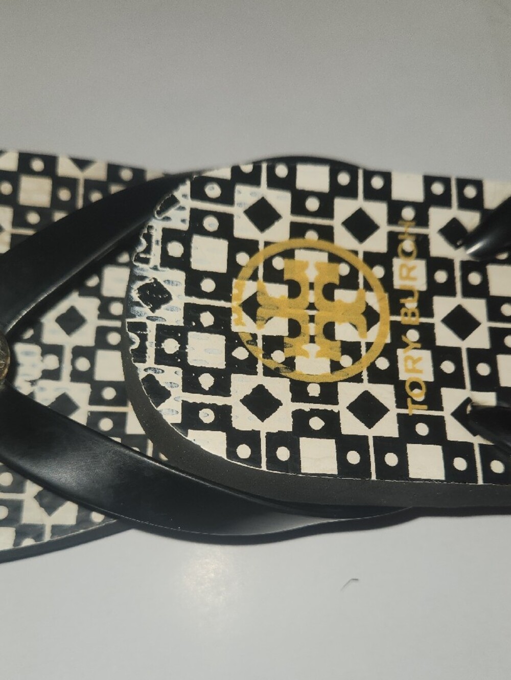 Tory Burch Black and White Geometric Logo Flip Flops with Gold Medallion - Picture 5 of 5